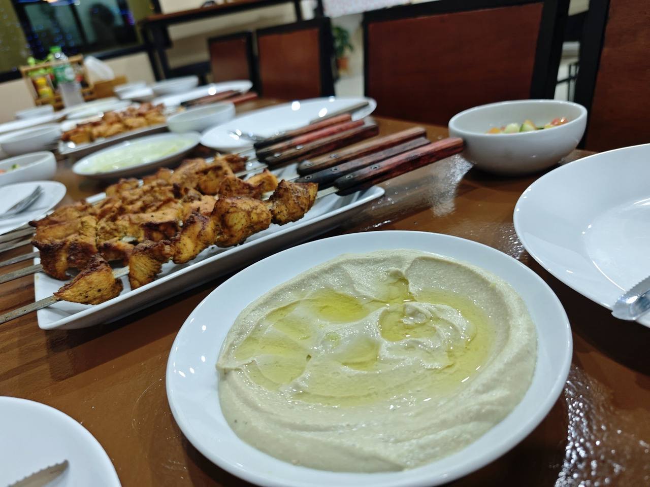 An assortment of Middle Eastern dishes on the table
